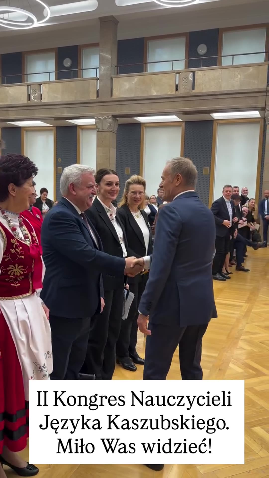 A reshared story shows the Polish prime minister greeting attendees at the Second Congress of Kashubian Language Teachers, shaking hands along a line of guests in a grand hall.