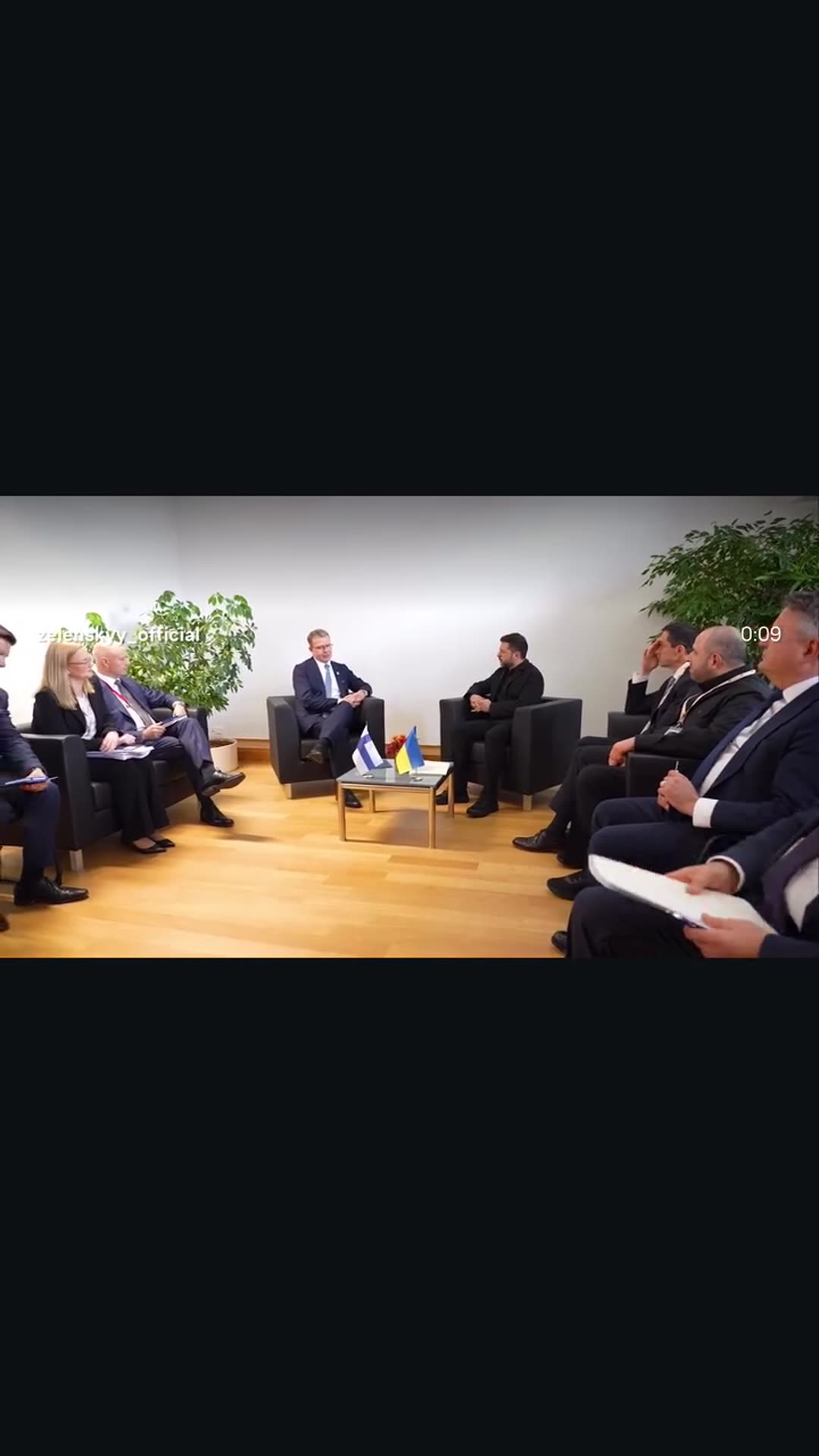 A story reshares Zelensky's reel of his bilateral meeting with Finnish PM Petteri Orpo. The reel shows a handshake, delegations seated around a small table with Finnish and Ukrainian flags, and Orpo speaking. According to the original caption, they discussed protecting Ukraine against Russian strik…