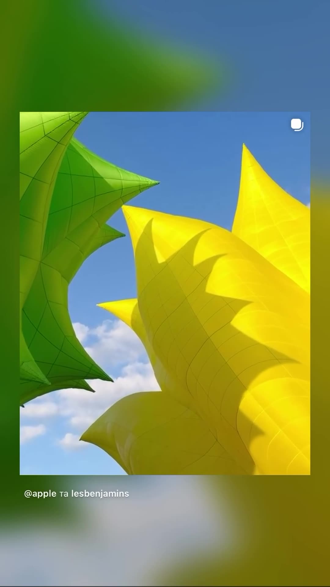 A story reshares Apple's carousel behind the scenes of the Les Benjamins 15-year anniversary fashion show in Cappadocia, shot on iPhone 18 Pro. It shows tulip-shaped yellow and green hot air balloons, models in yellow outfits and the filming crew.