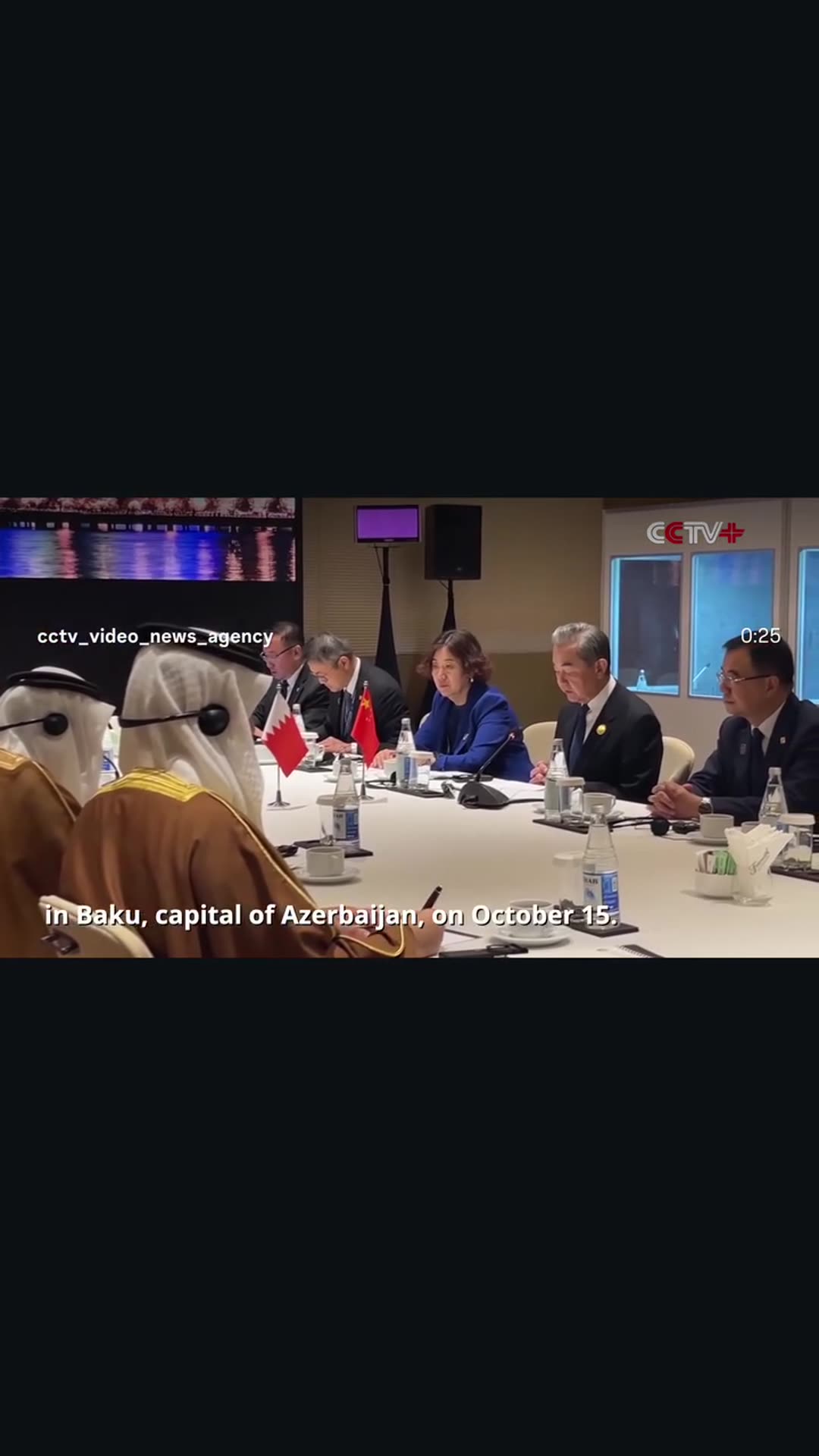 A story reshares a CCTV Video News Agency reel of Chinese Foreign Minister Wang Yi meeting Bahrain's Foreign Minister on the sidelines of the CICA summit in Baku.