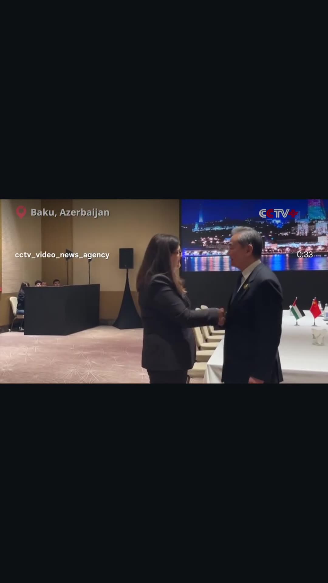 A story reshares a CCTV Video News Agency reel showing Chinese Foreign Minister Wang Yi greeting and meeting Palestinian Foreign Minister Varsen Aghabekian Shahin in Baku on the sidelines of the CICA summit.