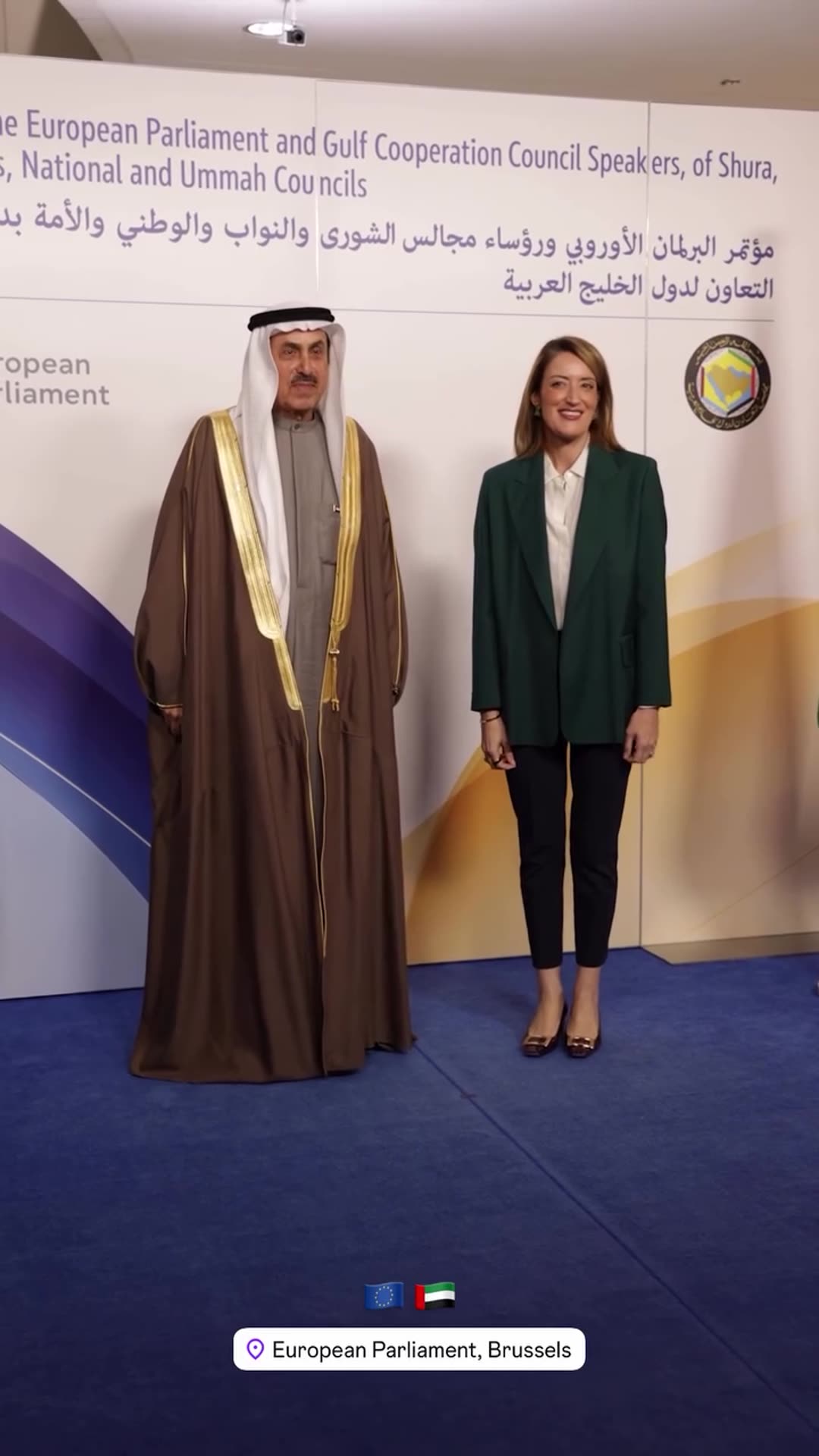 A reshared story shows a Gulf delegate being welcomed at the European Parliament in Brussels. They walk along a red carpet, pose in front of the EU–GCC speakers' conference backdrop, and the host reaches out to shake hands.