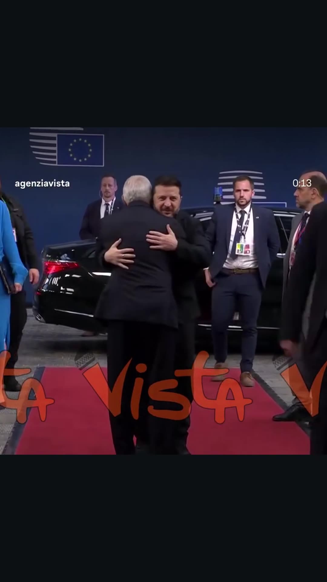 A story reshares an Agenzia Vista reel showing Zelensky arriving at the EU Council in Brussels, where Costa welcomes him with a hug. The two then walk inside together past staff and the EU flag.