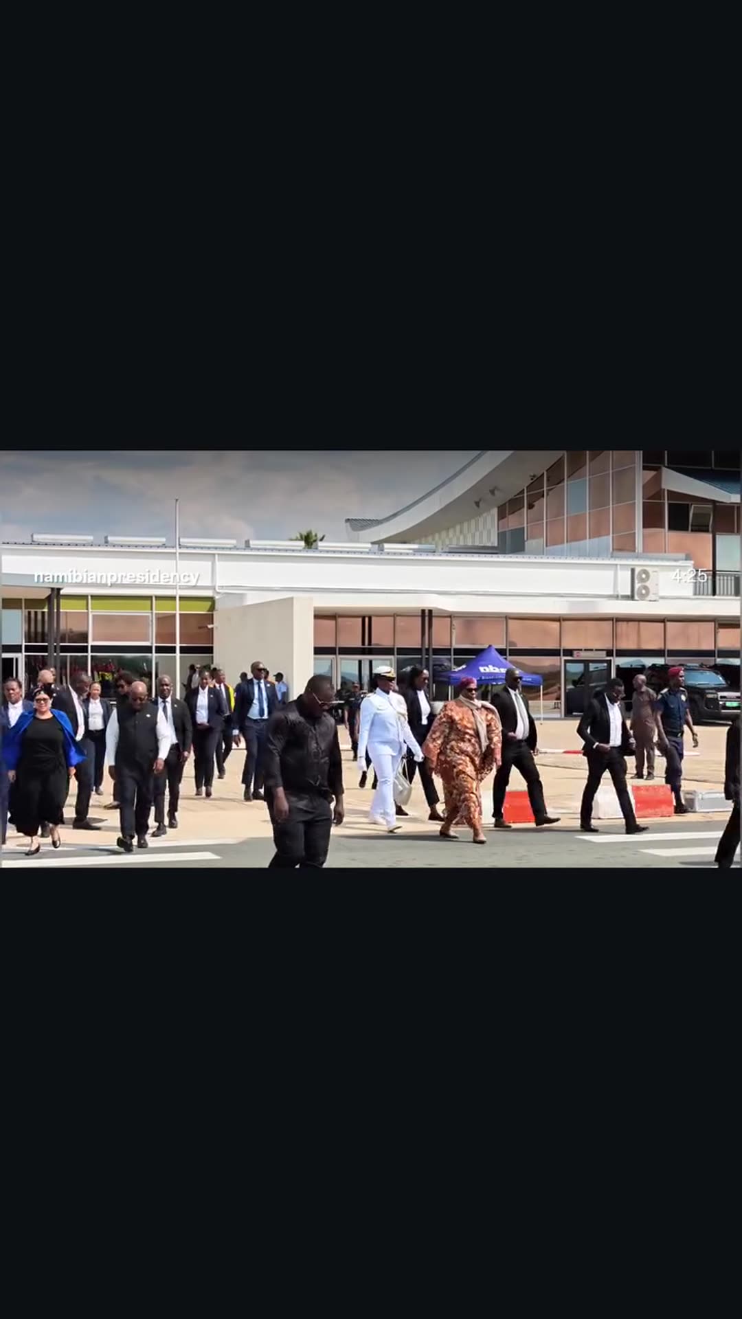 A story reshares the Namibian Presidency's reel of President Netumbo Nandi-Ndaitwah's departure ceremony at the airport before travelling to Luanda for the inaugural Angola-Namibia Bi-National Commission. The long original video shows the guard of honour, a military band, a farewell line-up, tradit…