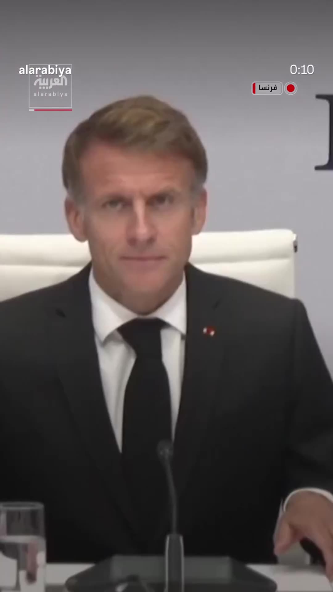 A story reshares an Al Arabiya reel showing French President Emmanuel Macron entering and taking his seat to chair an emergency meeting with ministers on the ongoing unrest in France, including the student protests and the looting and destruction of public property.