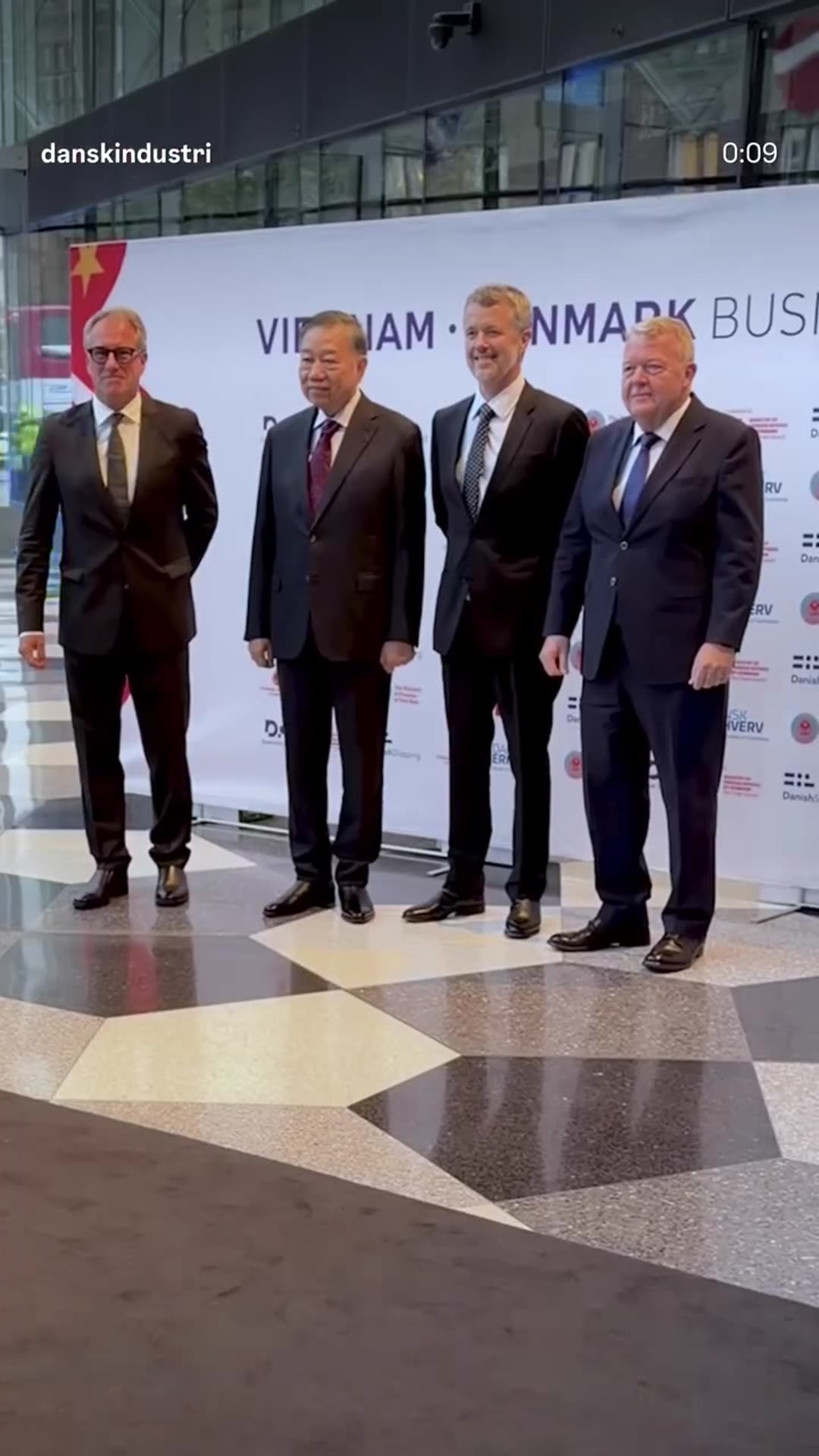 A story reshares Dansk Industri's reel of Vietnam's President Tô Lâm arriving at Industriens Hus in Copenhagen, being greeted by King Frederik and others, and posing for a photo at the Vietnam-Denmark Business Forum.