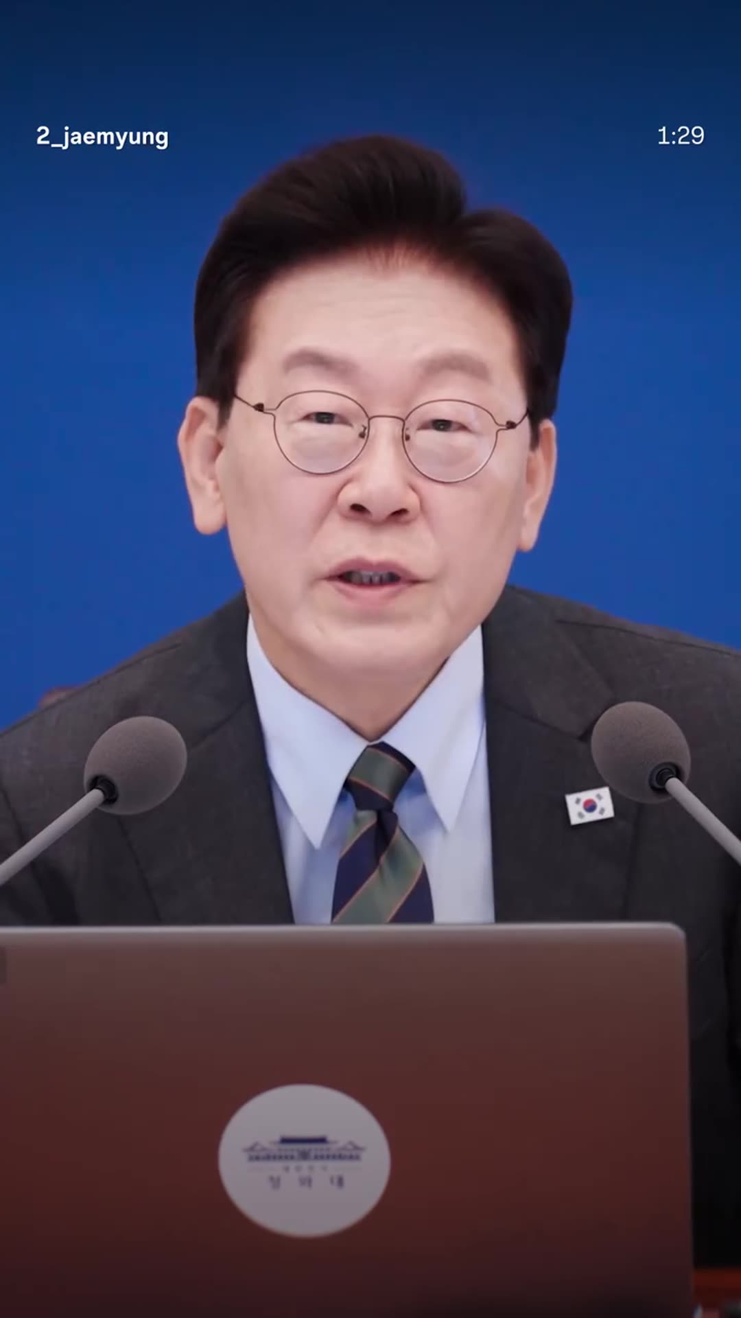 A story reshares the reel by @2_jaemyung (이재명) of a Cabinet meeting clip. The speaker questions welfare policies that require people to apply, which leave out those who do not know or forget to apply. He argues benefits should go automatically to all who qualify and asks the public for opinions in…