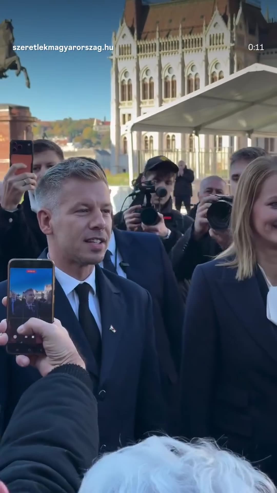 A story reshares a reel showing Hungary's Prime Minister, the Speaker of the House and another official greeting people at Kossuth Square in Budapest on the October 23 national holiday. The Prime Minister wishes everyone a nice holiday and invites them to the programmes in the city.