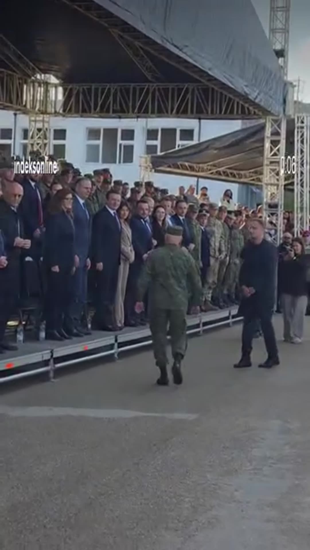 A story reshares an IndeksOnline reel in which the commander in chief of the Kosovo Security Force walks onto the parade ground and greets the prime minister and other officials on the viewing stand at a ceremony.