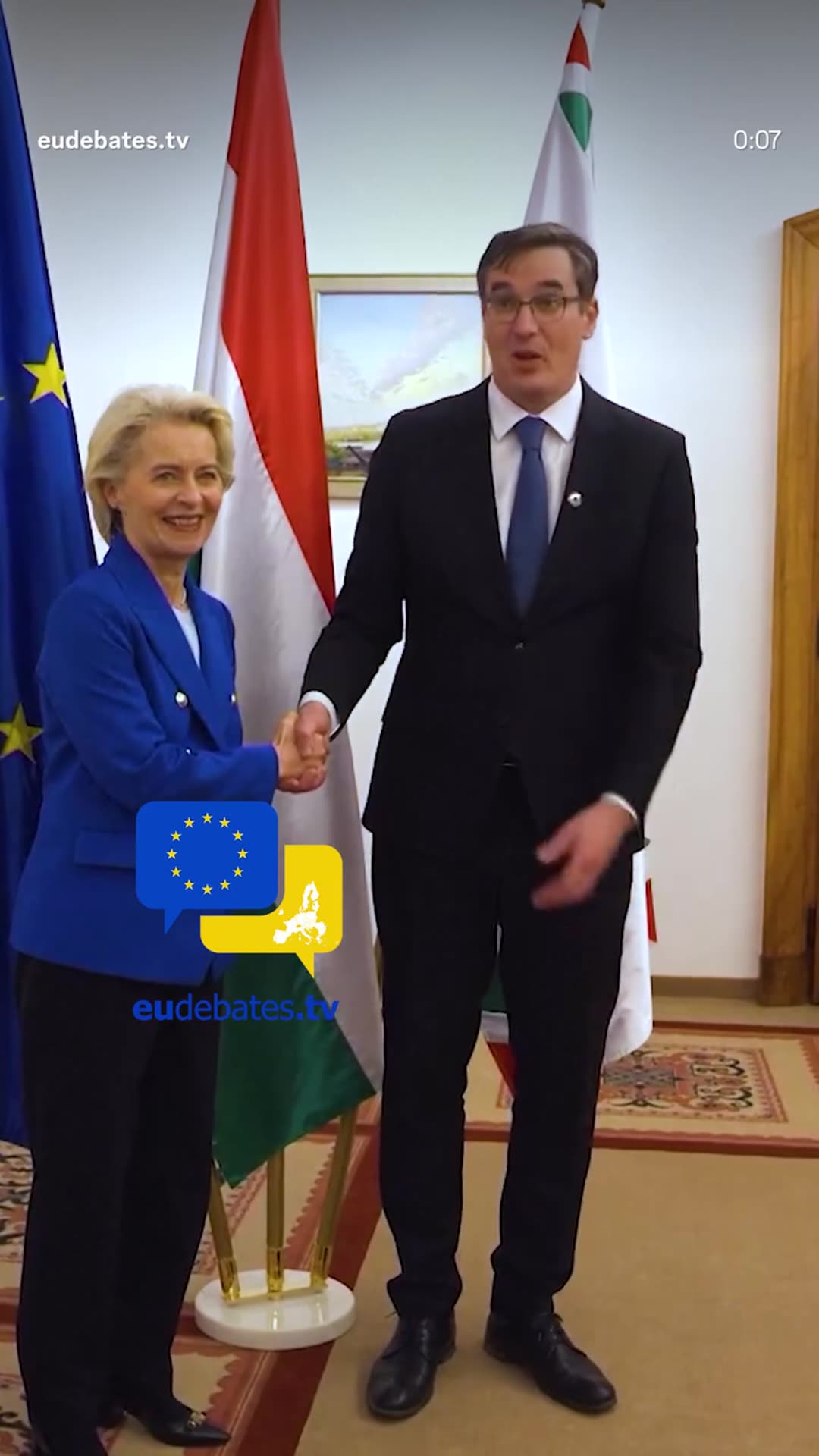 A story reshares an eudebates.tv reel of European Commission President Ursula von der Leyen arriving in Budapest and meeting Mayor Karácsony Gergely and Kata Tüttő. They walk through a vaulted corridor, shake hands in front of EU, Hungarian and Budapest flags, and pose together.