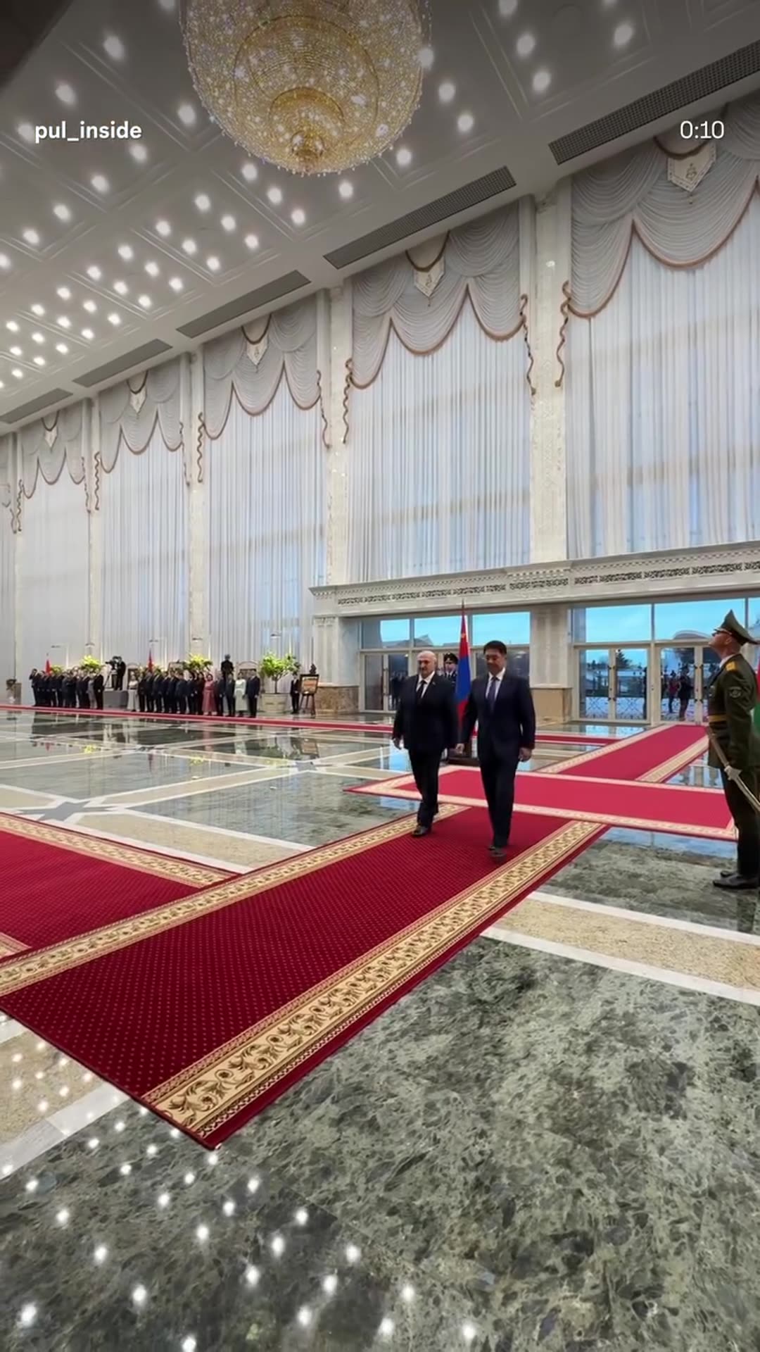 A story reshares pul_inside's reel of the official welcome ceremony for Mongolia's president at the Palace of Independence: honor guard, motorcade arrival, walk along the red carpet and a handshake photo.