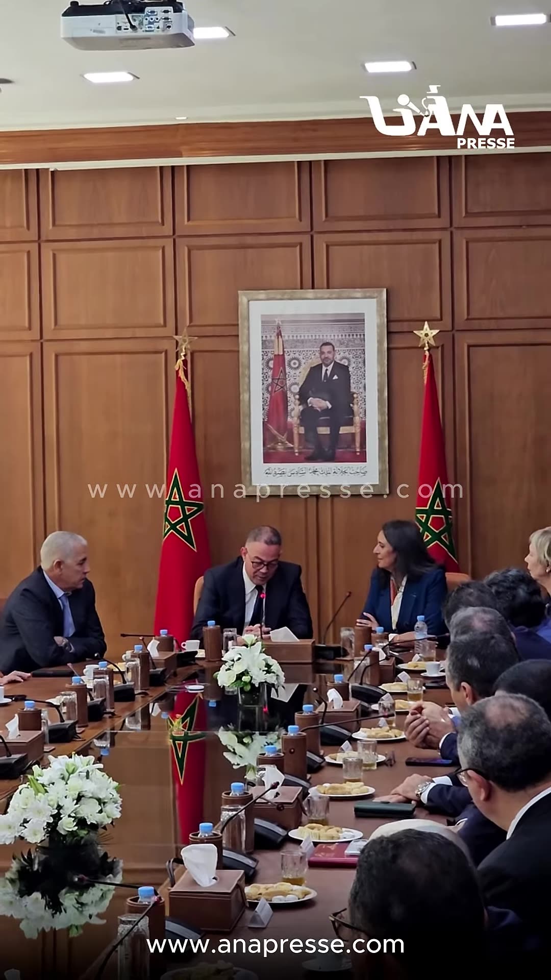 A reshared ANAPRESSE reel covers the handover ceremony at Morocco's Ministry of Finance, where Nadia Fettah takes over from Fouzi Lekjaa. It shows them walking the corridor, handshakes with officials, speeches at the conference table and a farewell outside.