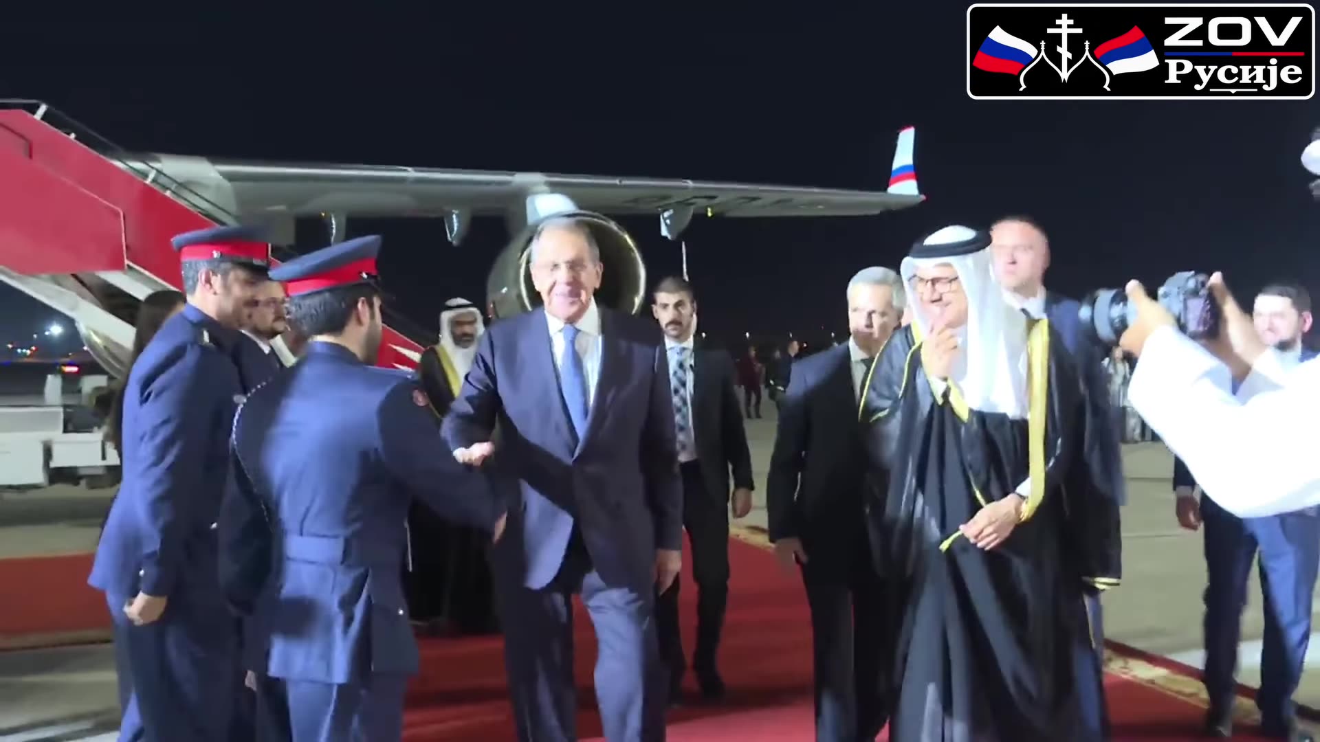 A reshared ZOV Русије reel shows Russian Foreign Minister Sergey Lavrov arriving at night in Bahrain and being welcomed on a red carpet at the airport, ahead of the ninth round of the Russia–Gulf strategic dialogue.