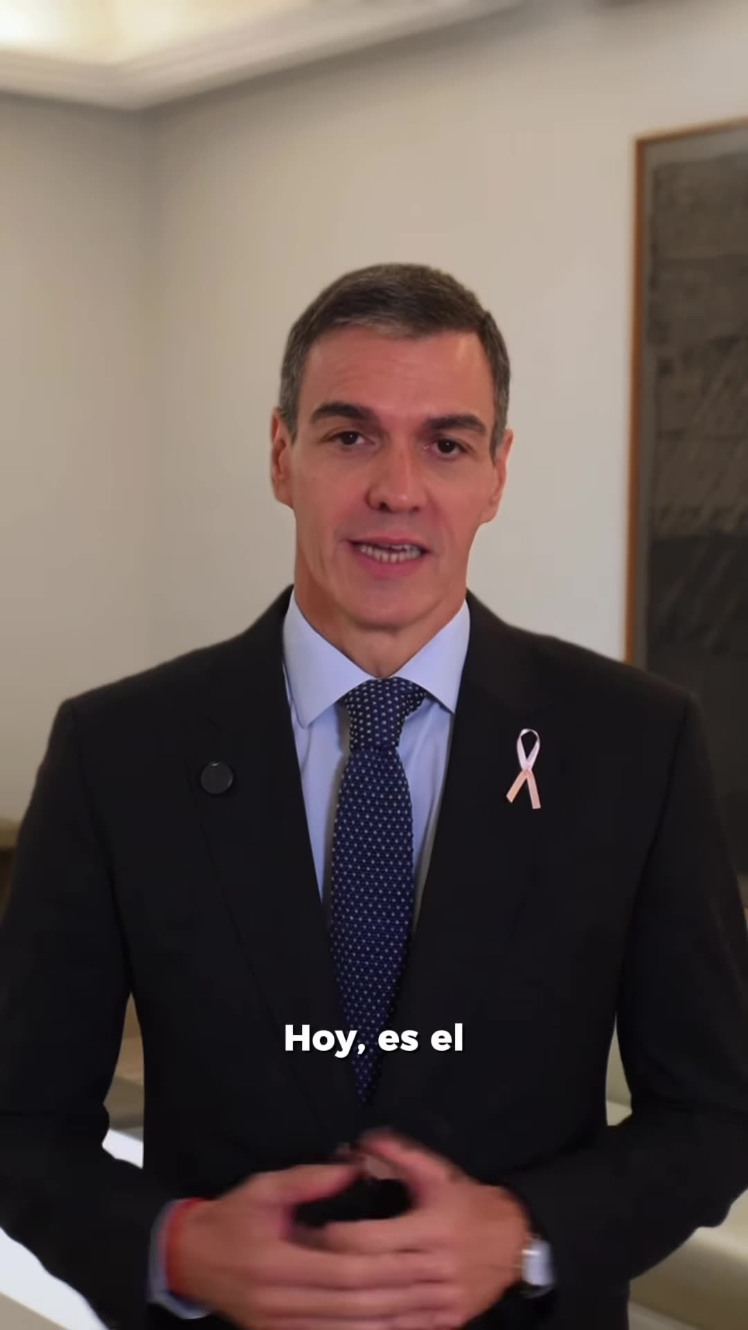 A reshared reel of a video statement for World Breast Cancer Day, calling for robust public healthcare that investigates, prevents, cares for and supports all women equally. The speaker cites the expanded breast cancer screening (ages 45 to 74) and a first study to predict personalised risk.