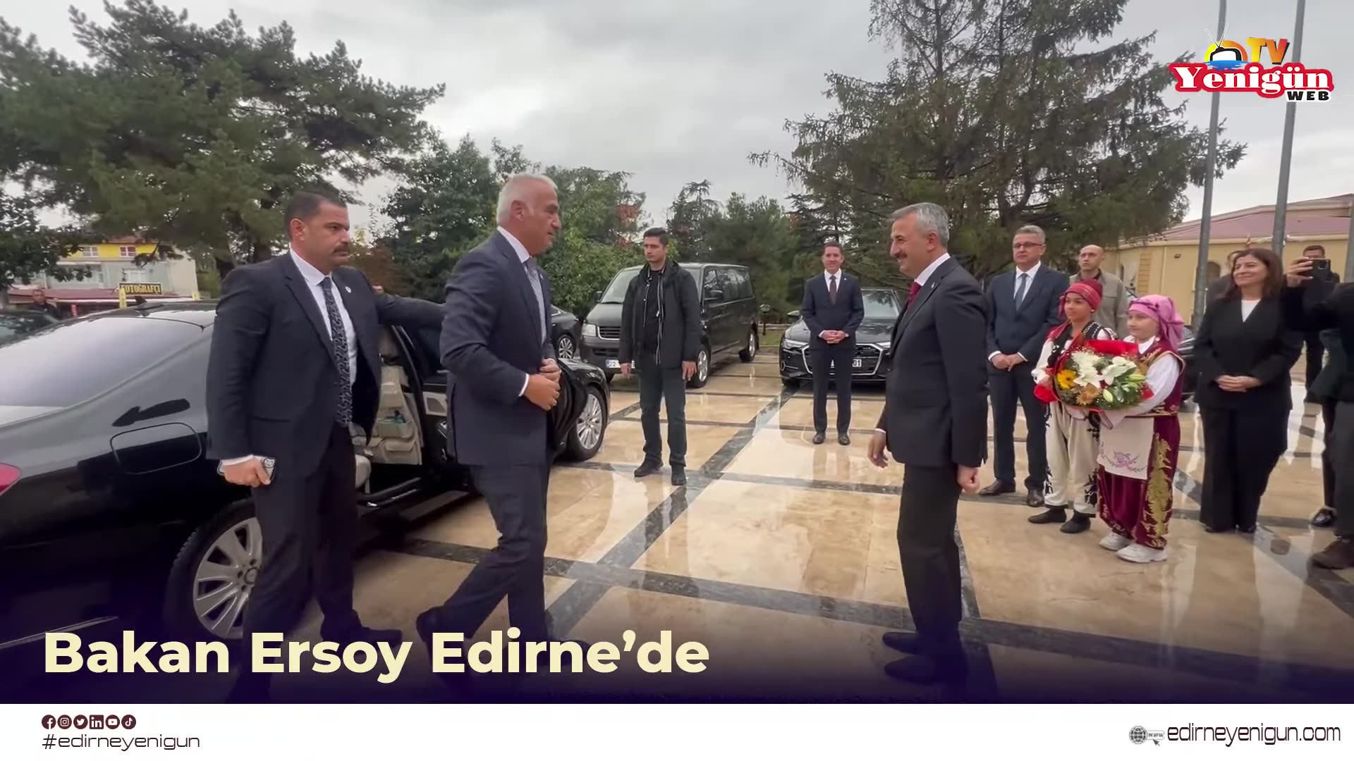 A repost of a Yenigün Gazetesi reel showing Culture and Tourism Minister Mehmet Nuri Ersoy being welcomed at the Edirne Governorship, greeted by children in folk costume and officials, and signing the guest book.